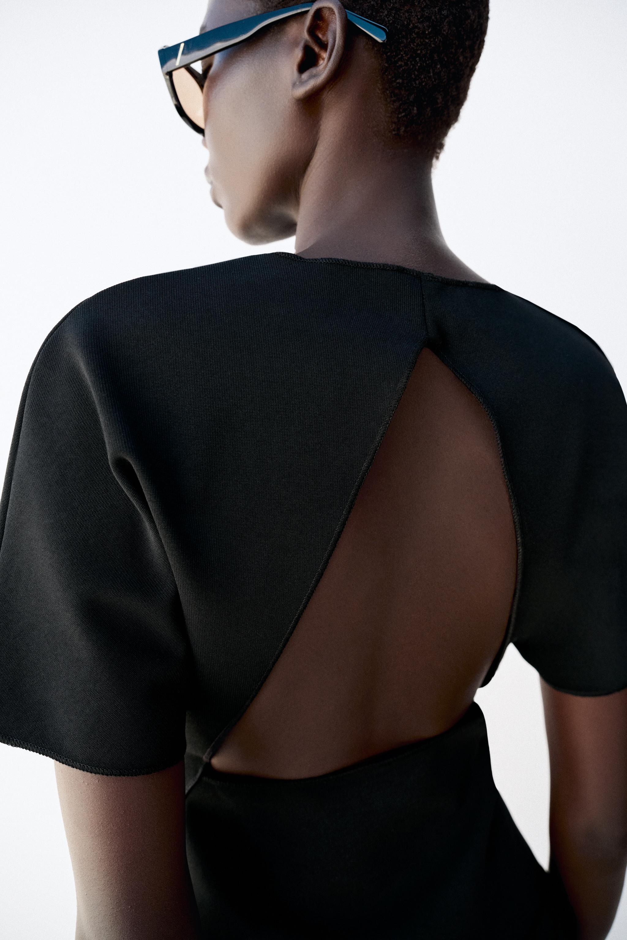 SHORT SLEEVE CUT OUT TOP